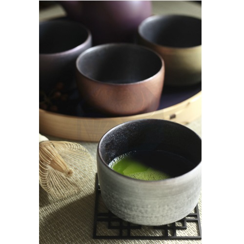 Handcrafted matcha bowls on display at TSURU-IPPUKU in Kyoto